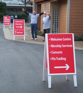 Members Larry Stevens & Herb Boesche of Trinity Lutheran Church, Richmond, B.C. prepare to welcome Olympic visitors
